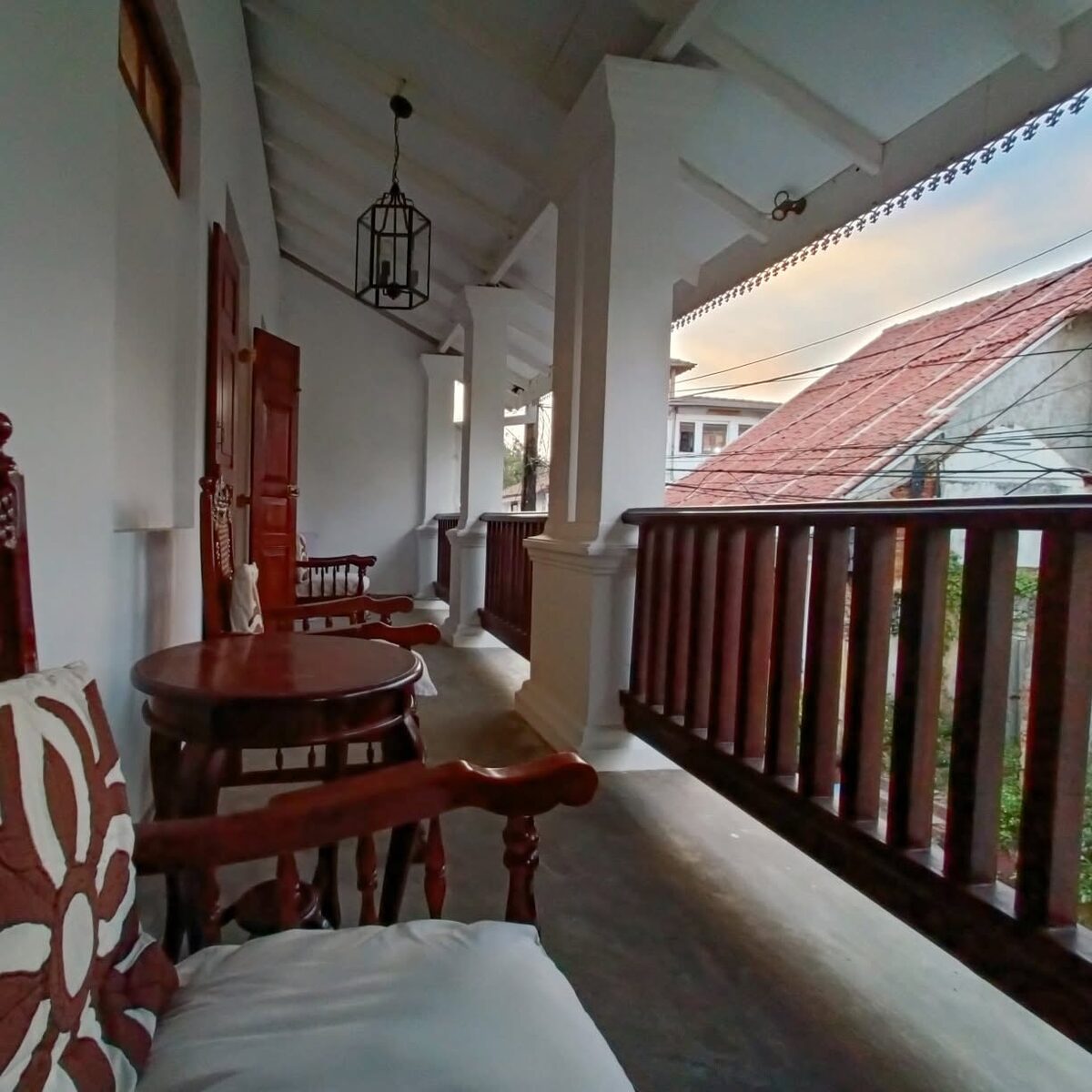 Upper verandah at sunset over the Fort's terracotta roofs